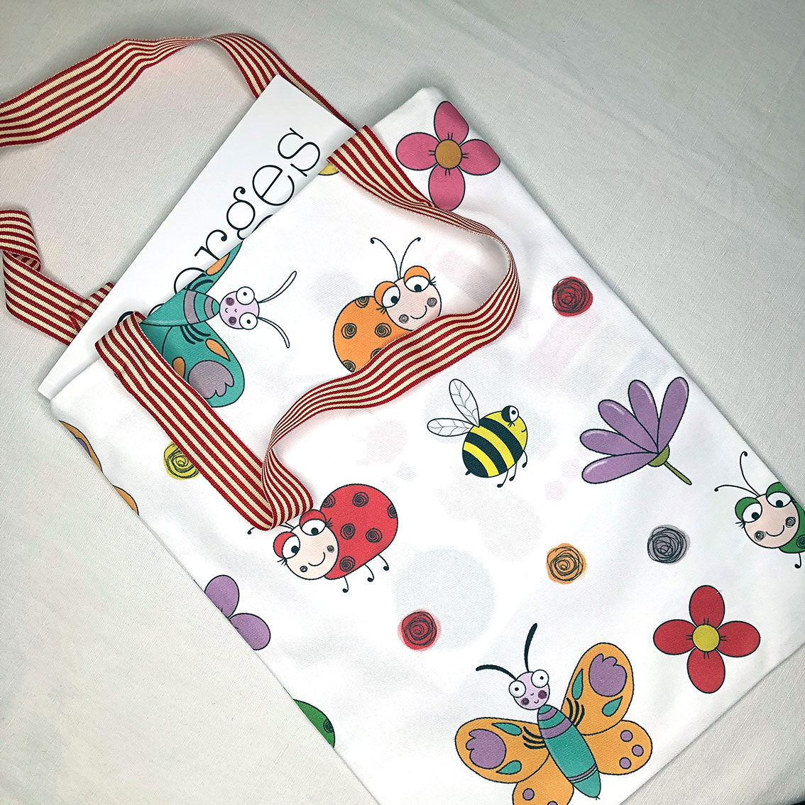 tote-bag pour enfant motifs papillons coccinelles abeilles Design Anne Da Cunha-Guillegault en exclusivité pour la marque An'imato