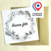 Carte postale Bonne fête avec une couronne de fleurs à colorier imaginée par Anne Da Cunha-Guillegault en exclusivité pour la marque An'imato