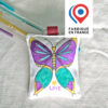 porte-clés papillon en tissu colorié et imaginé par Anne Da Cunha-Guillegault en exclusivité pour la marque An'imato