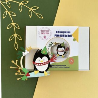 Kit cercle thème Noël avec un pingouin qui glisse sur la glace en papiers découpés avec cercle collé imaginé par Anne Da Cunha-Guillegault en exclusivité pour la marque An'imato