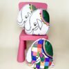 Trois coussins en forme d'éléphant fabriqués à partir des kits imaginés par Anne Da Cunha-Guillegault pour la marque An'imato