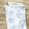 Pochon en tissu à colorier motifs papillons coccinelles abeilles imaginé par Anne Da Cunha-Guillegault en exclusivité pour la marque An'imato
