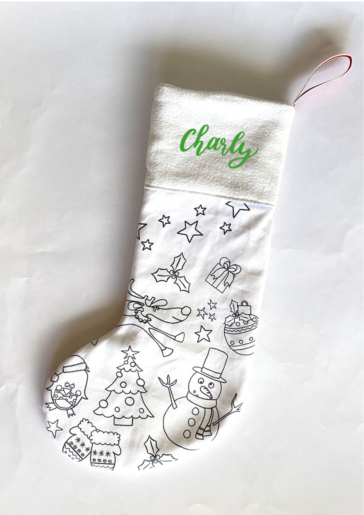 exemple de modification pour le kit coudre sa chaussette de Noël avec tissus illustrés et doublure recyclée imaginé par Anne Da Cunha Guillegault en exclusivité pour la marque An'imato